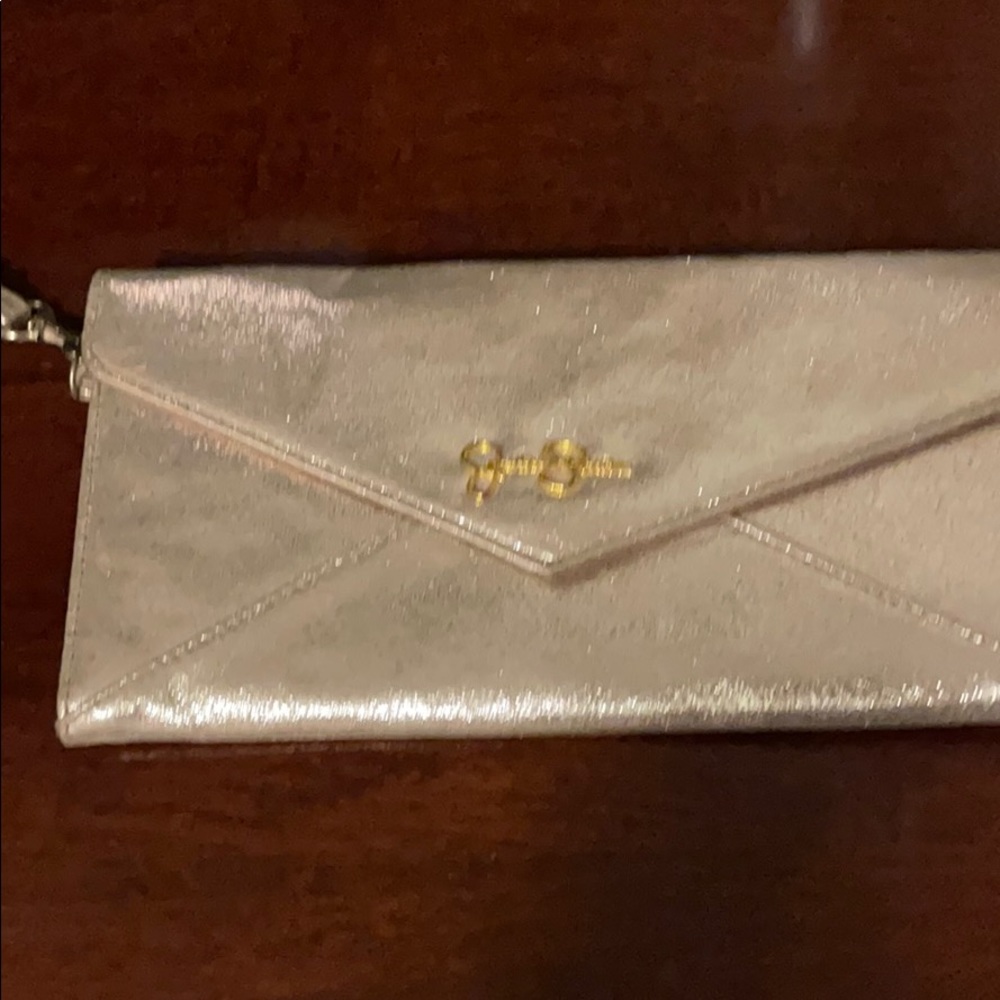 Gold Jessica Simpson wristlet